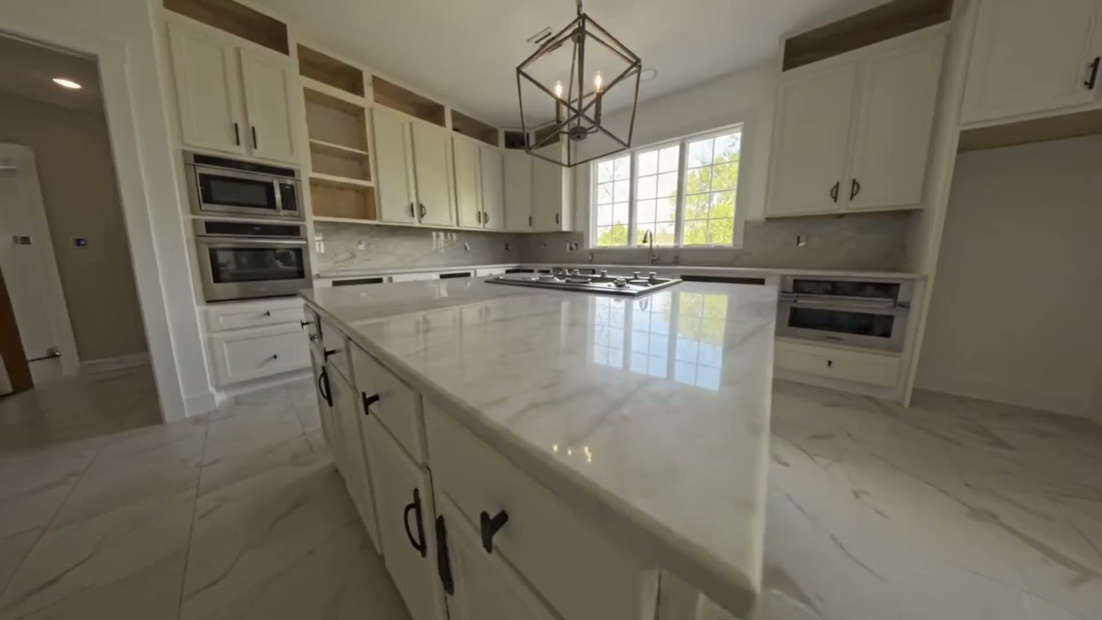 Waterfall quartz island fabricated and installed by Stone Elegance in Clifton, NJ
